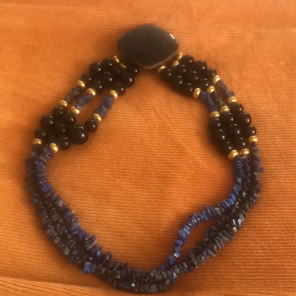 Lapis and Obsidian necklace with bronze beads. 19 inches long with two clasps.